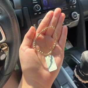 enewton gold bracelet